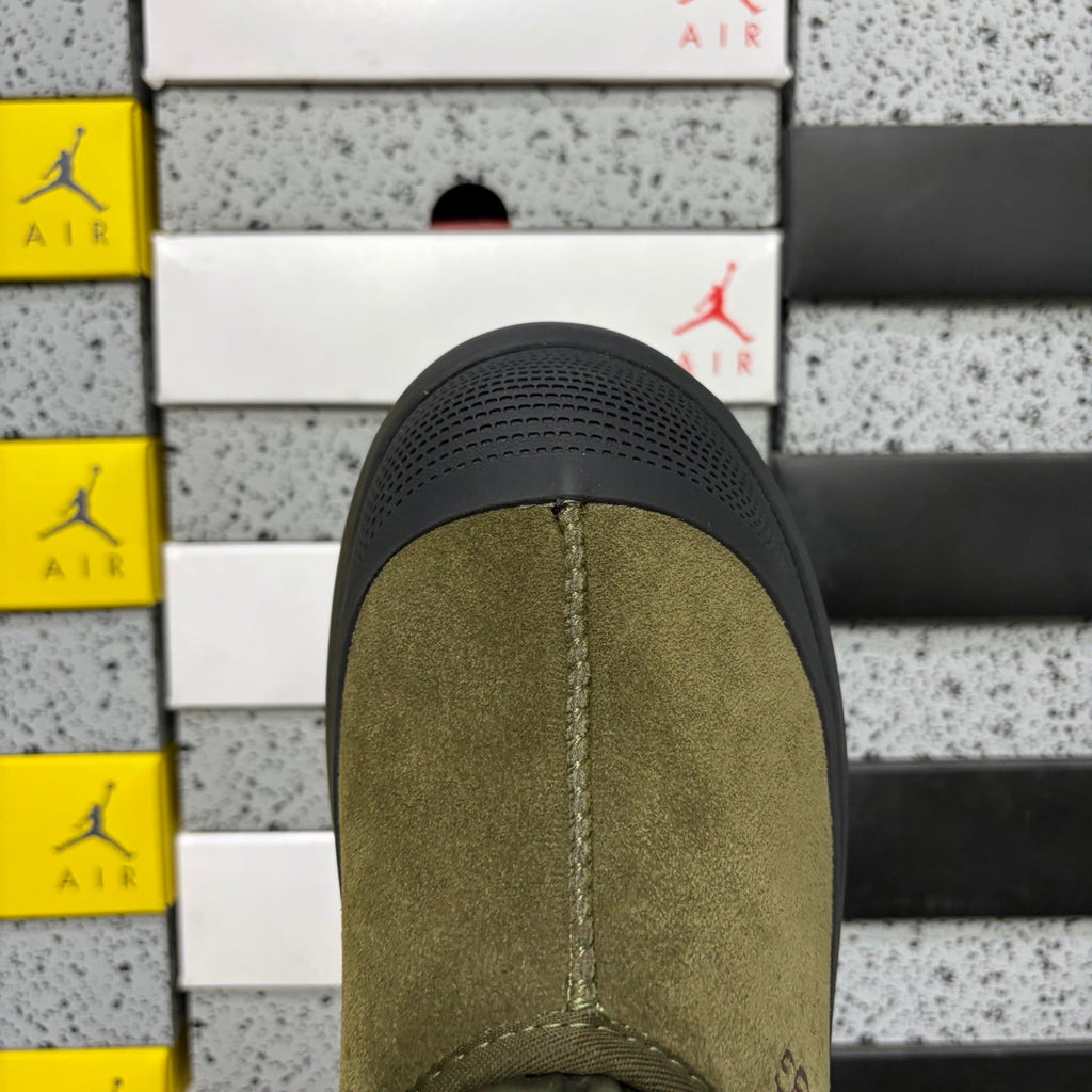 UGG Neumeel Deco Slip-On – Suede Moccasin Sneaker with Black Lug Sole & Tonal Drawstring in Olive
