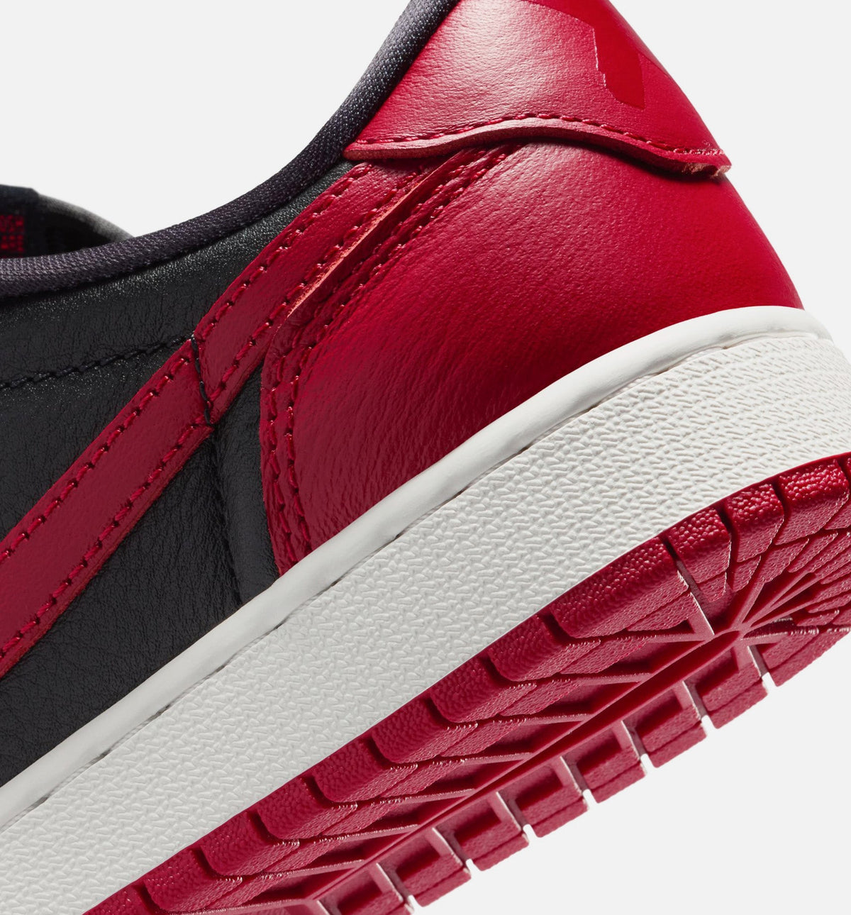 Air Jordan 1 Retro Low OG "Banned" Big Kids' Shoe – Black/Black/Varsity Red/Summit White